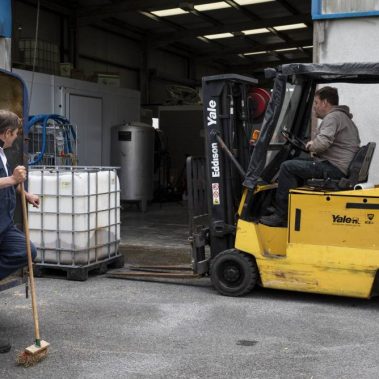 loading spent brewers grains with forklift